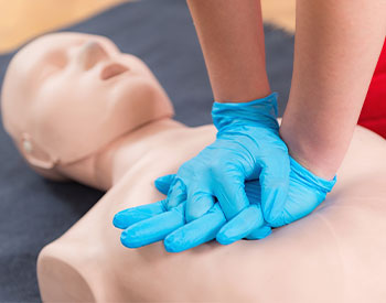 First Aid Training - Cardiopulmonary resuscitation. First aid course on cpr dummy.